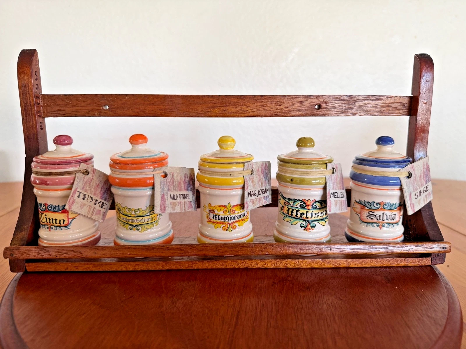 Vintage Italian Ceramic Spice Jar Set w/ Wooden Rack 5 Jars Hand Painted
Opens in a new window or ta