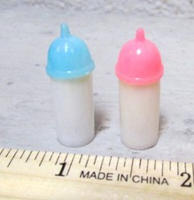 Vintage 1970s plastic mini baby bottles, pink  blue tops 1 inch tall, NEW