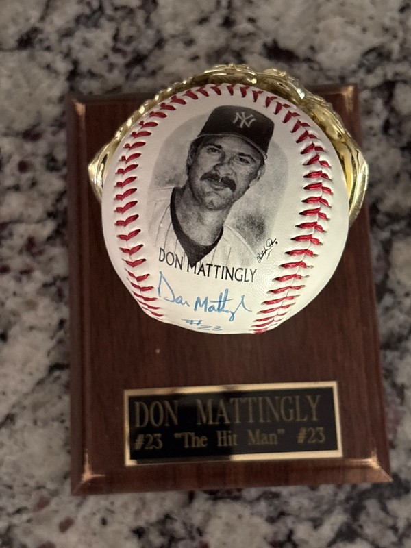 Don Mattingly autographed baseball with picture of signing and coa with case