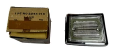 New Old Stock Left Back Up Light Lamp Assembly for 1963-64 Dodge Models #2244915