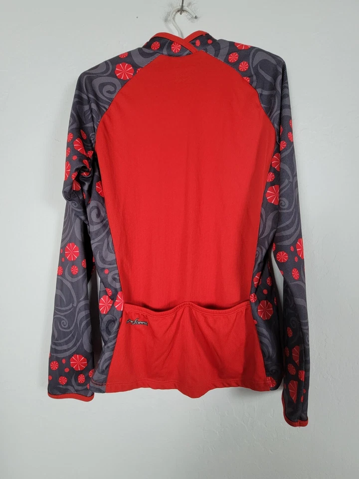 Camisa de ciclismo Shebeest roja manga larga para mujer grande media cremallera bolsillos exterior Foto 2 de 4