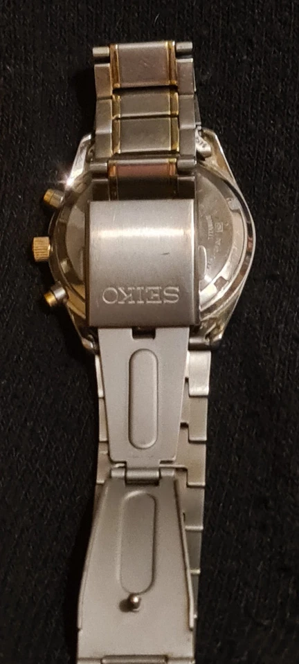 RELOJ DESPERTADOR SEIKO 7T62 0FD0 CUARZO ESFERA GRIS Y DORADA CAJA TITANIO CORREA UNA BELLEZA Foto 4 de 4