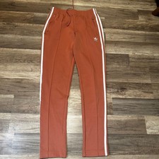 Womans Adidas Track pant Size XS light Pink With White Stripes