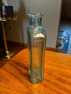 Antique 5 1/4 inch Blue, Three in One  Oil Co., Chemical Bottle