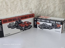 Wix 1966 Ford F-100 Truck Bank, a 1969 Ford Boss 302 Mustang Bank, and Trailer