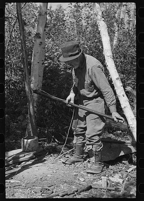 Photo:Winton Minnesota William Besson Removing Iron Pipe Drill 1937