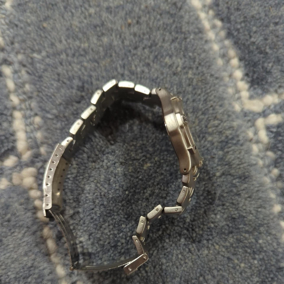 Sharp Silver Tone Red Dial Date Indicator Stainless Steel Band Watch 8 Inch - Image 4 of 4