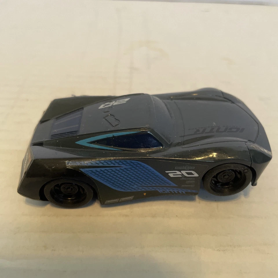 Coche de película Disney Pixar Cars Jackson Storm DXV34 1:43 rollos genial es rápido Foto 3 de 4