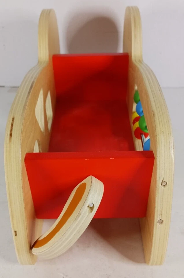 Juguete de desarrollo de perros de madera Manhattan Toy Company contando formas de colores 2019 Foto 4 de 4