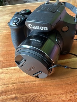 Zubehörpaket: Canon PowerShot SX60 HS Kamera, Schwarz mit Praxisbuch und Stativ
