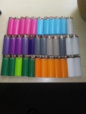 35 empty Bic full size lighters--all empty or near empty