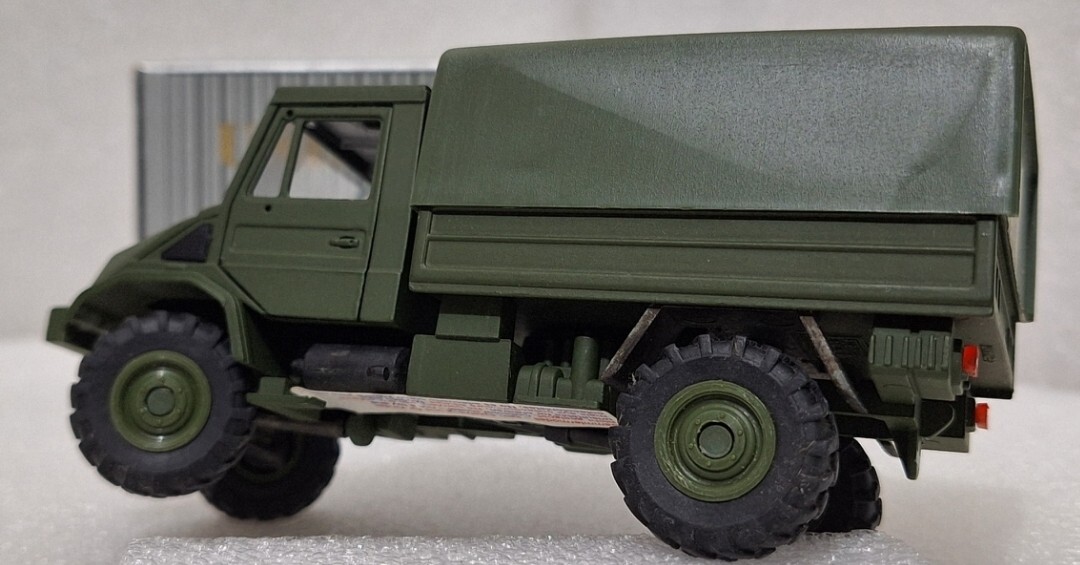 5) Mercedes-Benz UNIMOG U140 L 1993 Army Green 1:43 NZG