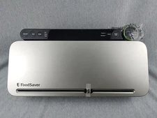 FoodSaver VS3130 Multi-Use Food Preservation System with Handheld Vacuum Sealer.