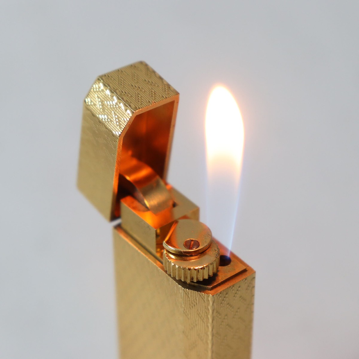 Working CARTIER Pentagon Pattern Roller Gas Lighter Gold 1A32924 