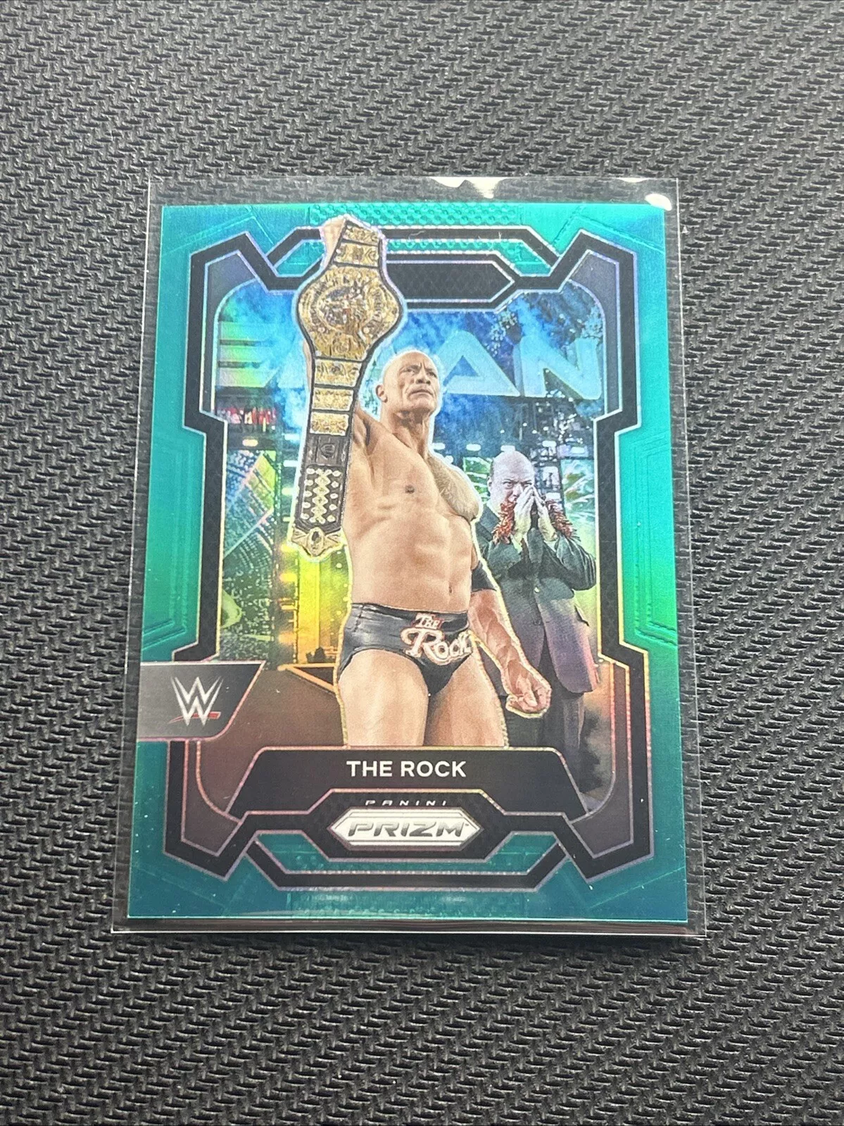 2024 Prizm WWE The Rock Teal /49 #193