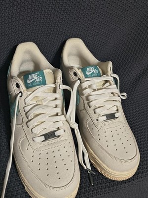 Nike Air Force 1 Sneakers in Cream with Teal Swoosh