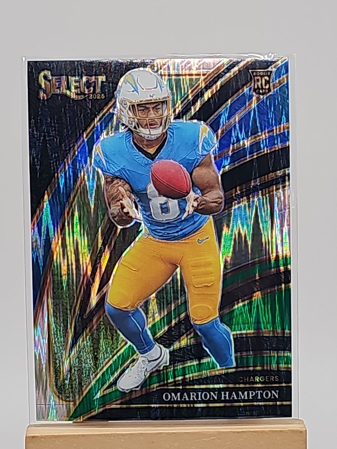 2025 Panini Select Omarion Hampton Black And Green Shock Club #202 Chargers