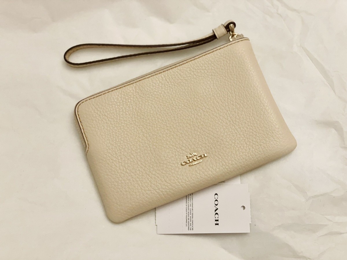 Coach X Peanuts Corner Zip Wristlet With Snoopy And Friends Motif