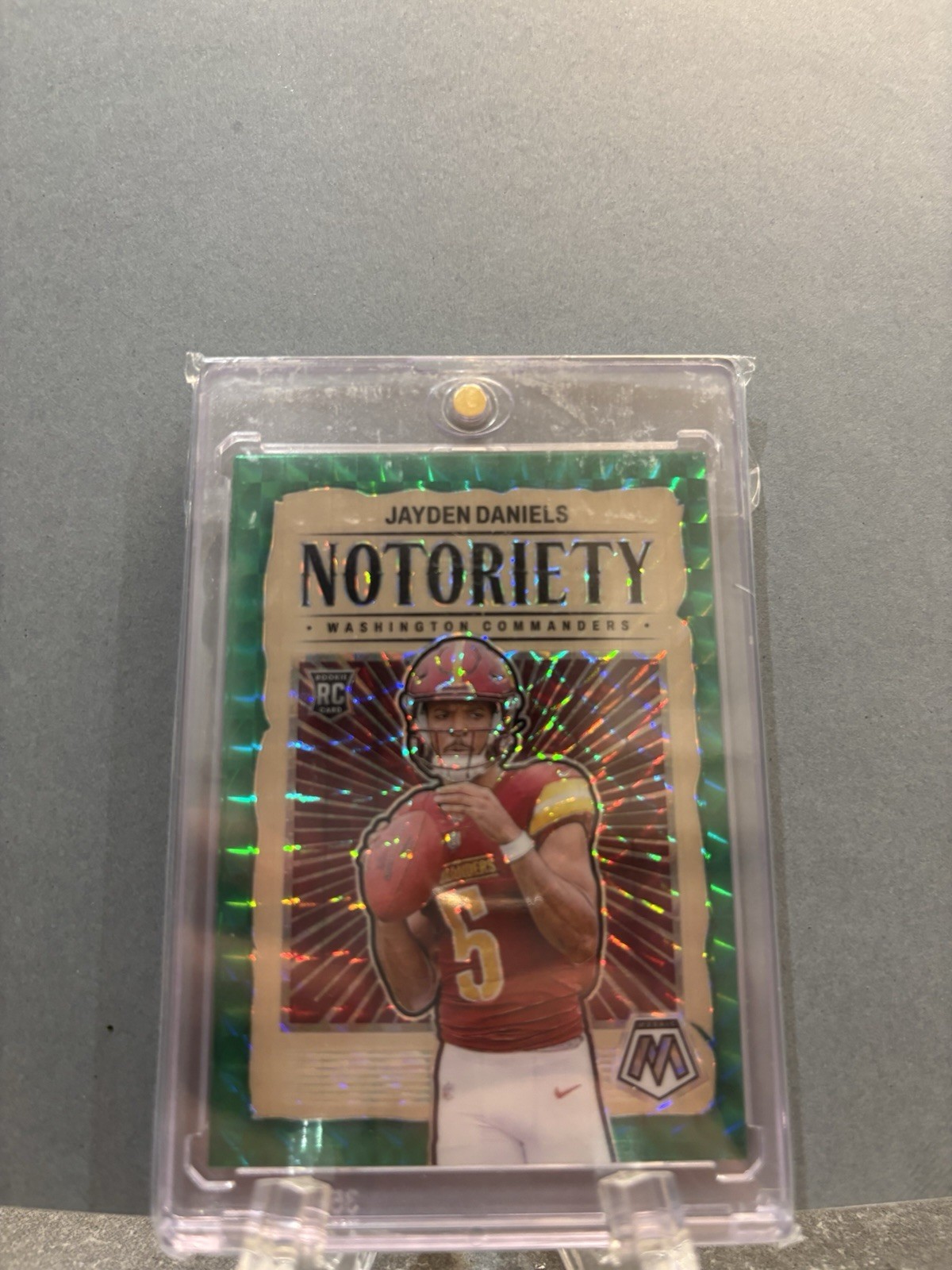 2024 Panini Mosaic - Notoriety Jayden Daniels #19 Green Mosaic Prizm (RC)