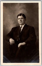 Antique RPPC Postcard Handsome Man Dark Suit Seated Astoria OR 1910s