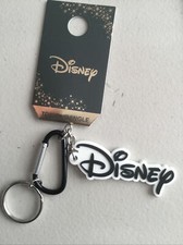 DISNEY LOGO REISE BAUMELN SCHLÜSSELANHÄNGER TASCHENANHÄNGER NEUES DESIGN AUF KARTE PRIMARK