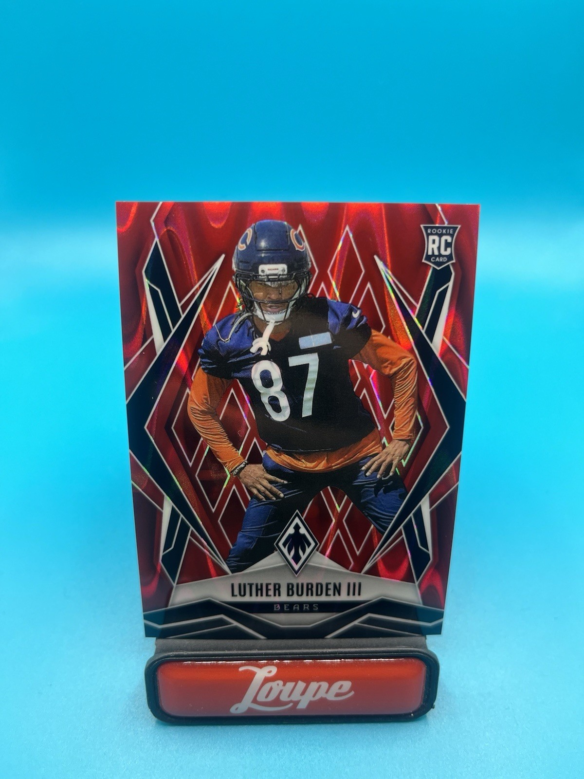 Luther Burden III 2025 Panini Phoenix Red Seismic RC 7/99 #196 Chicago Bears