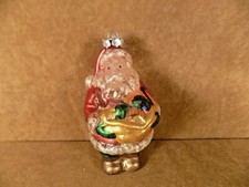 OLD WORLD CHRISTMAS ORNAMENT-GLASS-SANTA WITH TOYS