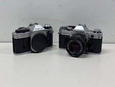 Canon AE-1 Program Bundle - 35mm SLR Film Camera w/ 50mm f/1.8 Lens