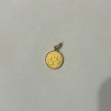 Ciondolo in oro 18 k   Lira del 54. Punzoni