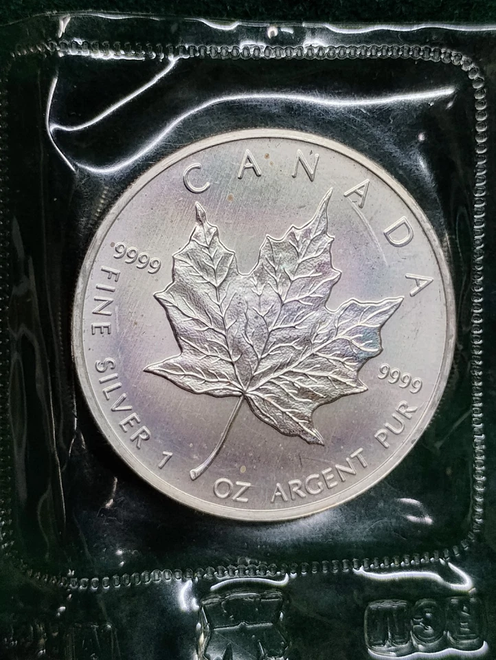 Moneda de Arce Canadiense 1989 Hoja de Arce Sellada RMC 1 OZ 9999 Plata Tonificada Arco Iris Halo Foto 2 de 4