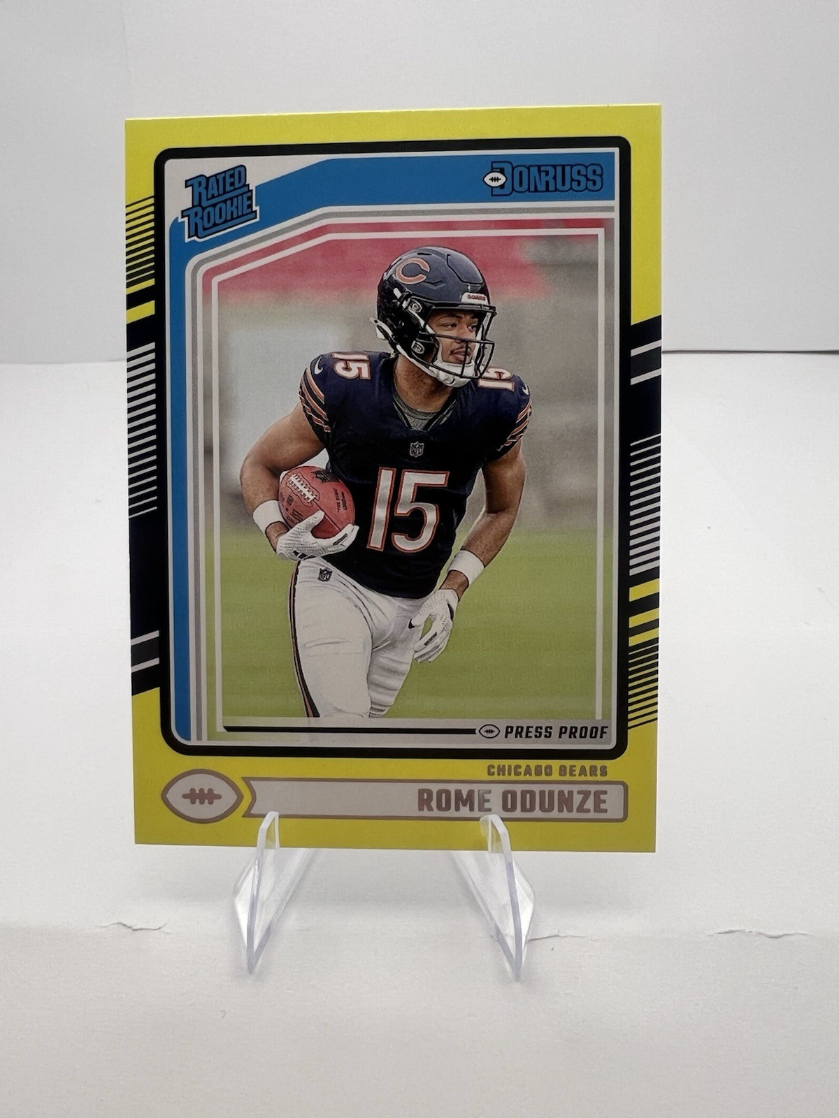 2024 Panini Donruss - Rated Rookie Rome Odunze #309 Press Proof Yellow (RC)