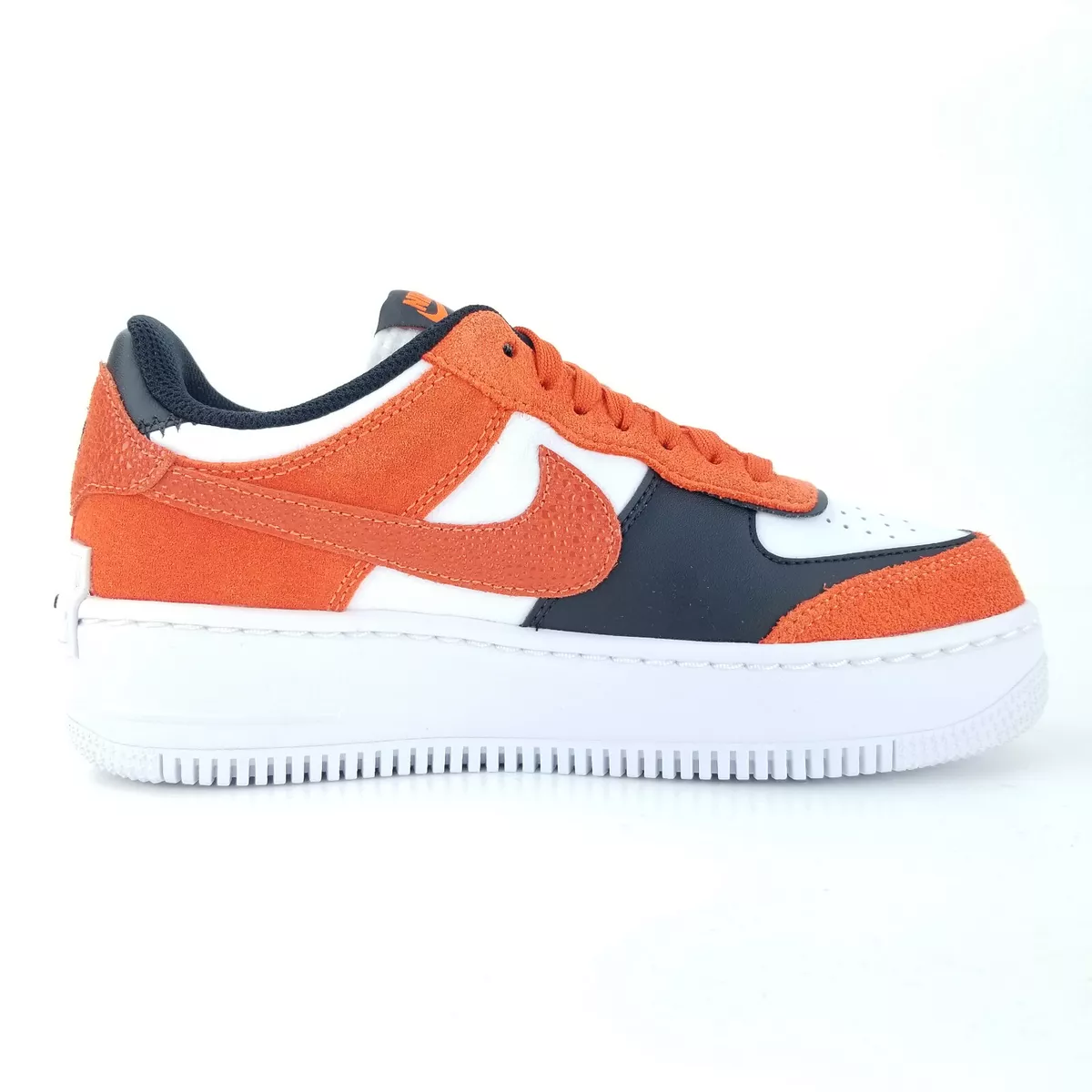 women orange nike shoes