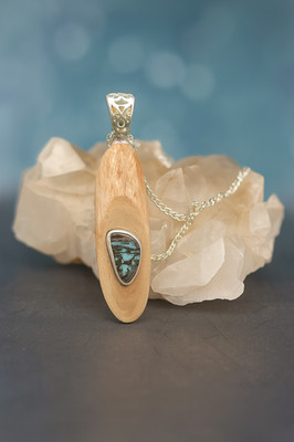 Australian boulder opal and sterling silver pendant set in Australian gum with s