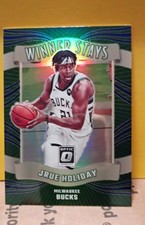 2023-24 Panini Donruss Optic - Winner Stays Jrue Holiday #9 Purple Prizm