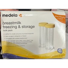 Medela Bottles for Breastmilk Freezing and Storage 10 2.7oz bottles with lids.