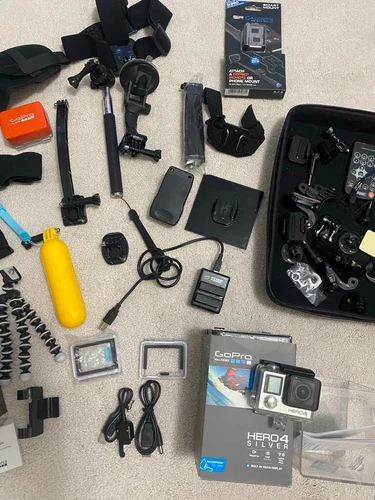 GoPro Hero 4 Silver w/ Remote Batteries Mounts HUGE BUNDLE OF ACCESSORIES