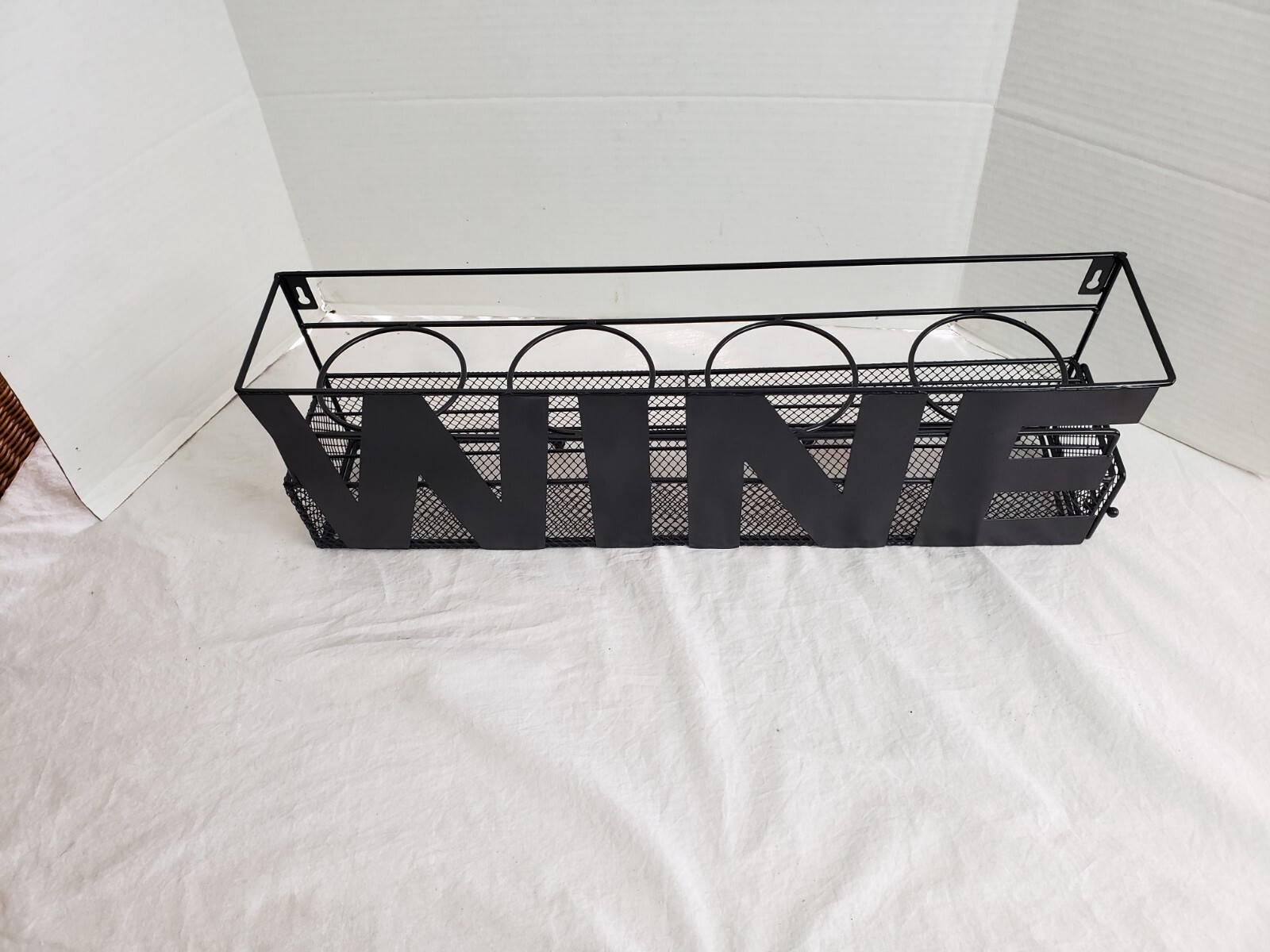 black metal 4 wine bottle and cork holder 24" x 7.5" x 4.5"