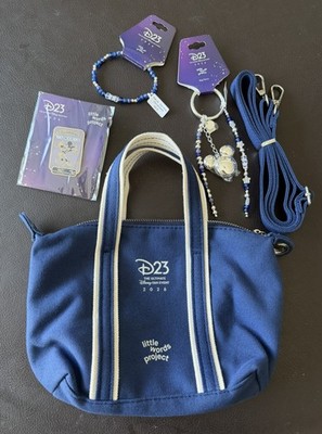 D23 Expo 2026 Exclusive Little Words Project Bundle Bag, Pin, Charm, & Bracelet