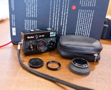 Rollei 35 SE Black 35mm Film Camera 40mm Sonnar F2.8 Lens in Mint condition.