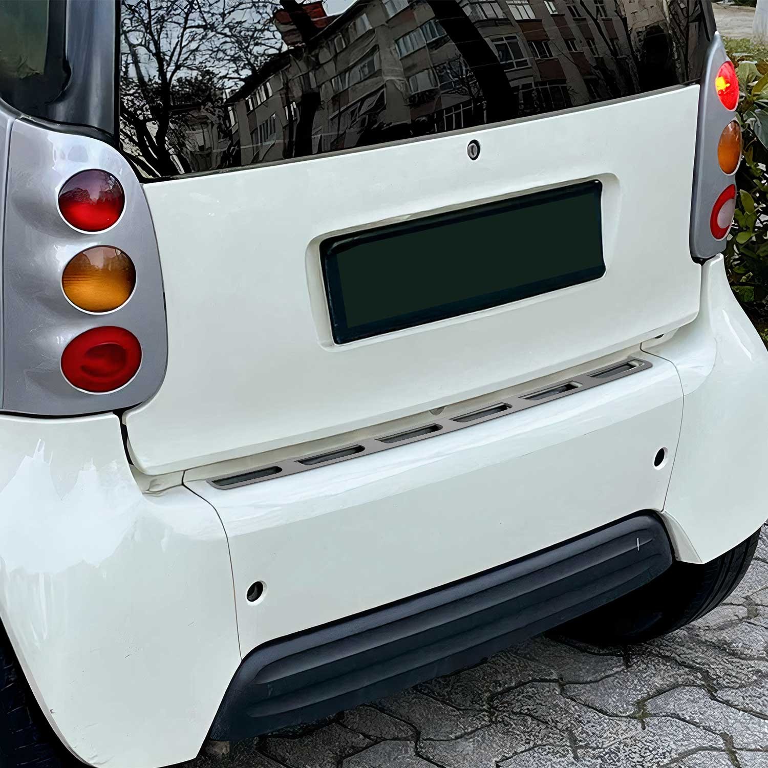 Protéger carrosserie Smart Fortwo W450 avec garde pare-chocs arrière inox poli