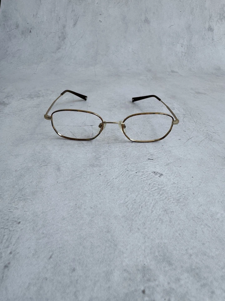 Marco de gafas Flexon ovalado dorado titanio memoria metal ligero Foto 2 de 4