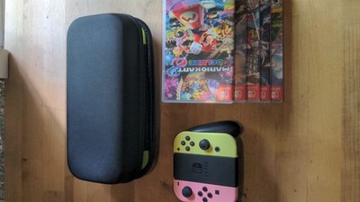 Nintendo Switch Bundle   Complete Setup + 3 Pairs of Controllers + 7 Games