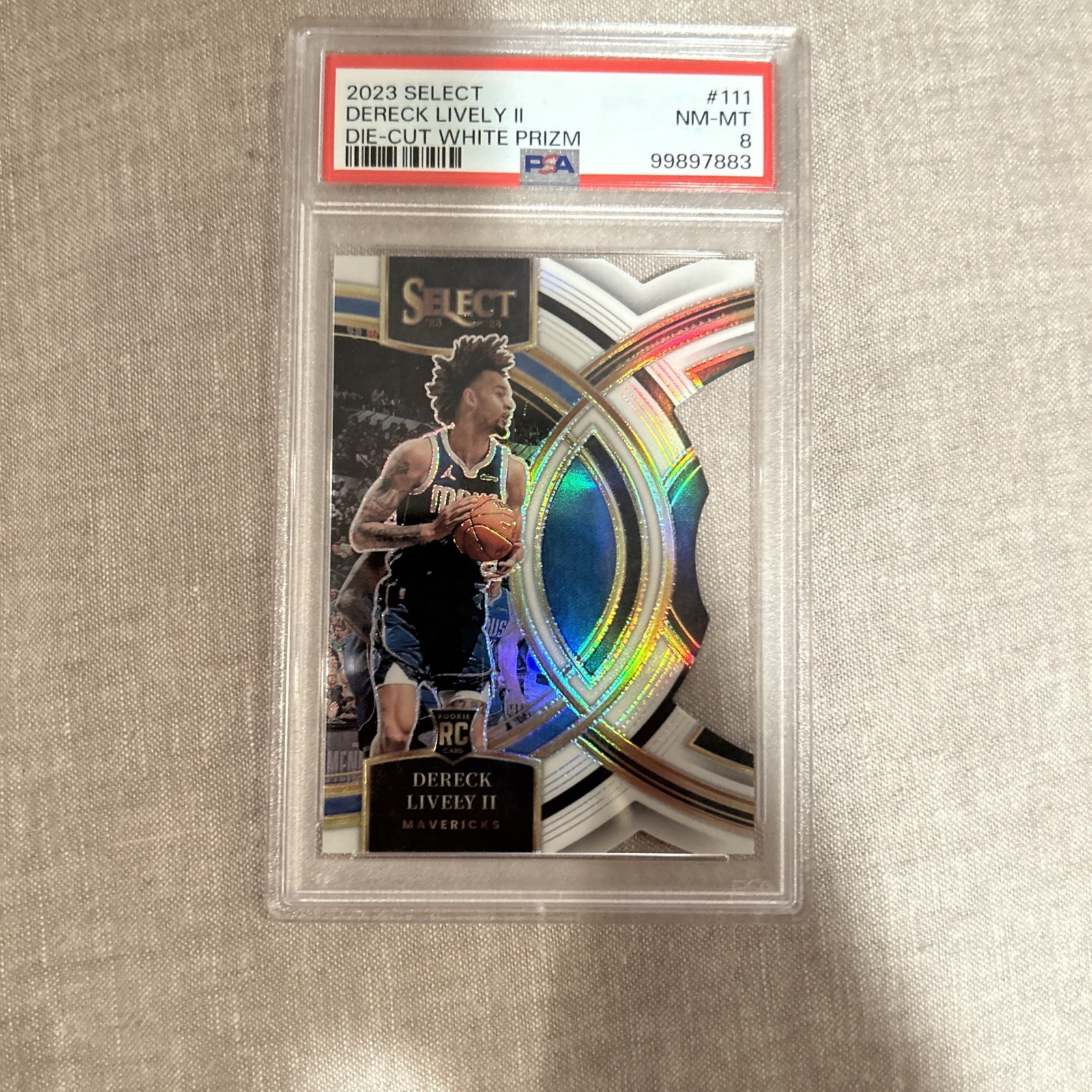 2023-24 Panini Select Premier Level Dereck Lively White Prizm Die-Cut /149 (RC)