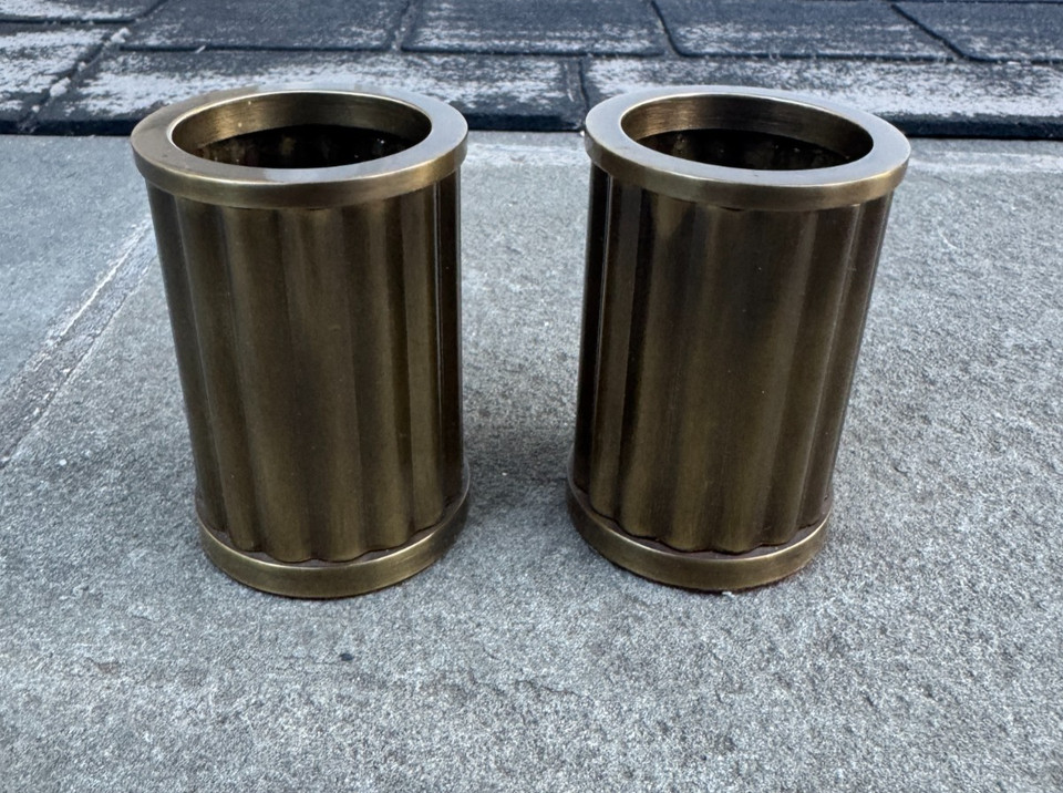 Heavy solid brass pen cup with a felt-lined base — the kind of weighty, no-nonsense desk piece that makes plastic organizers feel embarrassing.