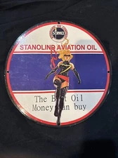 VINTAGE STANDARD OIL COMPANY STANOLIND AVIATION PORCLEAIN PINUP GAS OIL AD SIGN