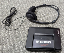Vintage Sony Walkman Cassette Tape Player WM-2011  Headphones and New Belts