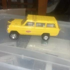Vintage 1970s Metal TONKA Yellow Jeep Grand Wagoneer Truck