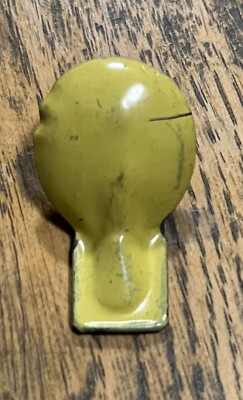 Vintage gelbes Blechschild Gegenfeder Clicker Klacker Penny Spielzeug 30 mm