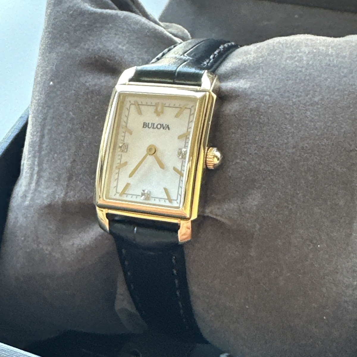 Caravelle by Bulova Ladies Watch White Dial Black Leather Strap Date Window A sleek rectangular dress watch from Caravelle by Bulova  main image 2