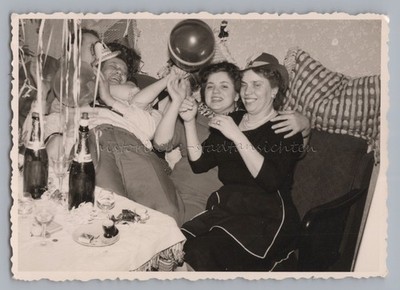 Women and Men Have Fun Celebrating with Champagne - Old Photo